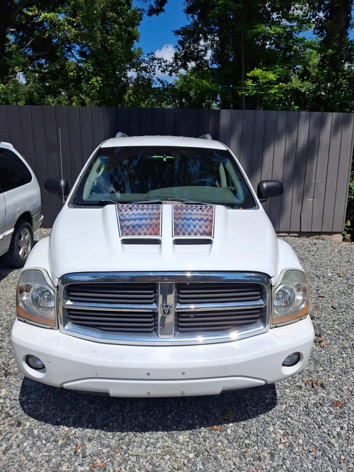 Front view of white SUV parked outdoors — The ARK Body Shop and Collision Center in Concord